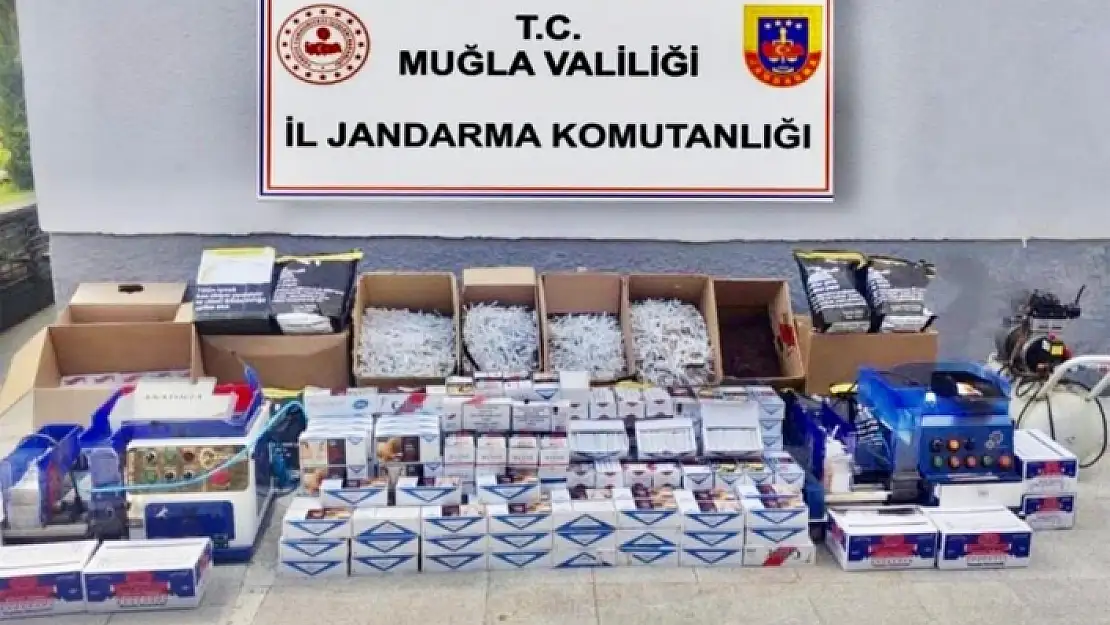 KÖYCEĞİZ'DE KAÇAK SİGARA ÜRETİLEN EVE OPERASYON: 2 KİŞİ YAKALANDI