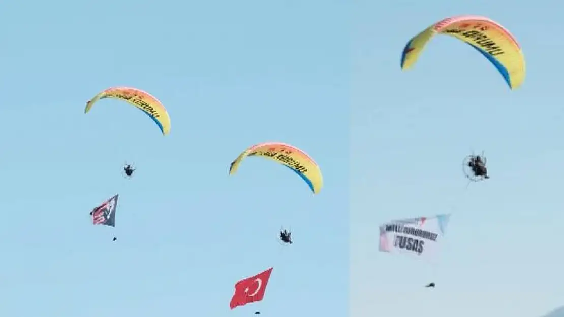 Fethiye'de THK paramotor ekibi 'Milli Gururumuz TUSAŞ' yazılı pankartla uçuş yaptı