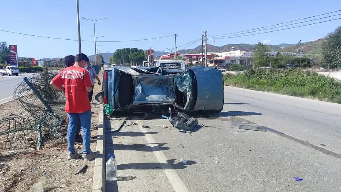 Seydikemer'de otomobil takla attı: Baba ve kızı yaralandı