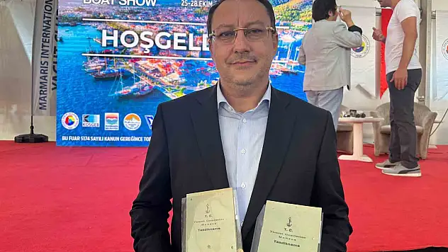 TİCARET ODASI BAŞKANI AYHAN'A 92 YILLIK TASTİKNAME